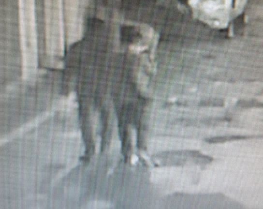 Surveillance footage shows the two in an alley in Daejeon at 11:38 p.m. on March 18. (Yonhap)