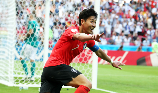 This photo taken on July 27, shows South Korea's Son Heung-min celebrating after scoring a goal against Germany in a 2018 FIFA World Cup Group F match at Kazan Arena in Kazan, Russia. (Yonhap)