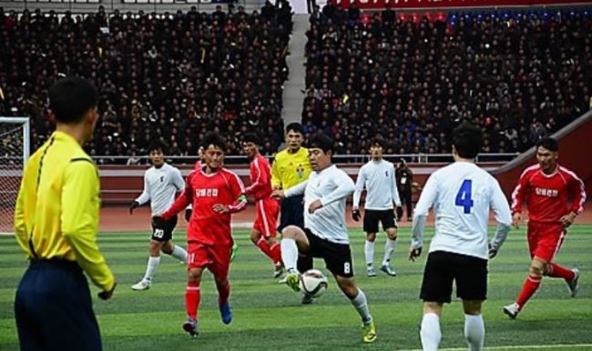 This file photo shows an inter-Korean laborers' football match in Pyongyang in 2015. (Yonhap)