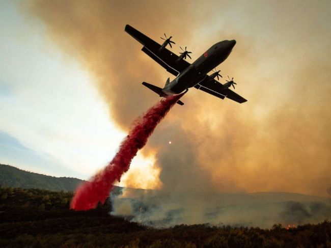 An air tanker drops retardant on the Ranch Fire, part of the Mendocino Complex Fire, burning along High Valley Rd near Clearlake Oaks, California, Aug. 5. (AFP)
