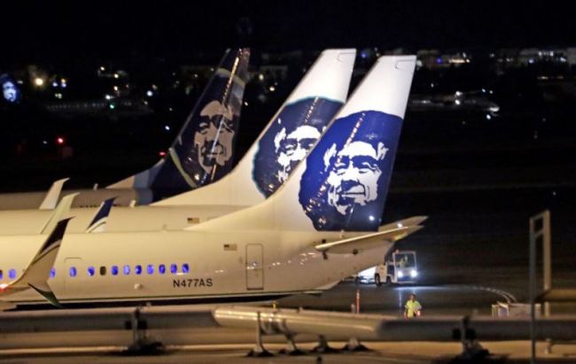 Alaska Airlines planes sit on the tarmac at Sea-Tac International Airport, on Aug. 10, in SeaTac, Wash. (AP)