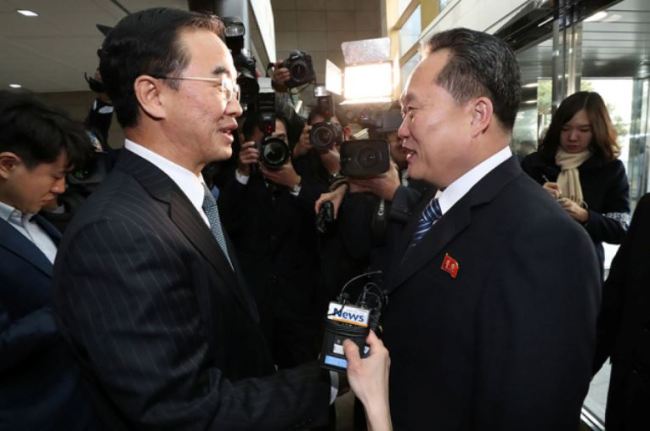 Head of the North Korean delegation Ri Son Gwon shakes hands with his South Korean counterpart Cho Myoung-gyon before their meeting at the truce village of Panmunjom in the demilitarized zone separating the two Koreas, South Korea, Jan. 9. (Reuters)