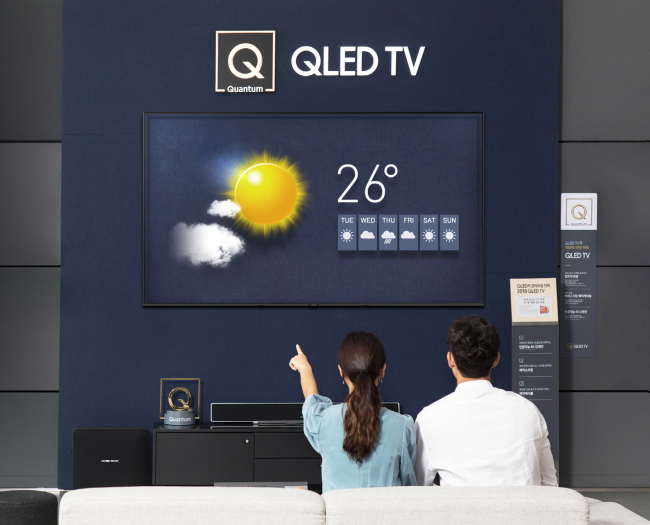 QLED TV ZONE -- The newly furbished QLED TV Zone at Samsung Digital Plaza in Yongin, Gyeonggi Province, is displayed Sunday. Samsung Electronics has installed the QLED TV experience space at some 300 Samsung Digital Plaza locations nationwide to showcase the premium TVs’ superior display quality as well as unique features such as the “magic screen” and “magic cable.” (Samsung Electronics)