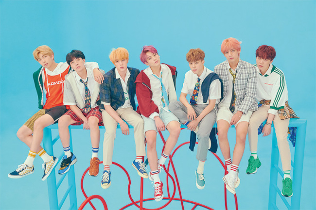 BTS sends message of carpe diem through festive mood of 'Idol