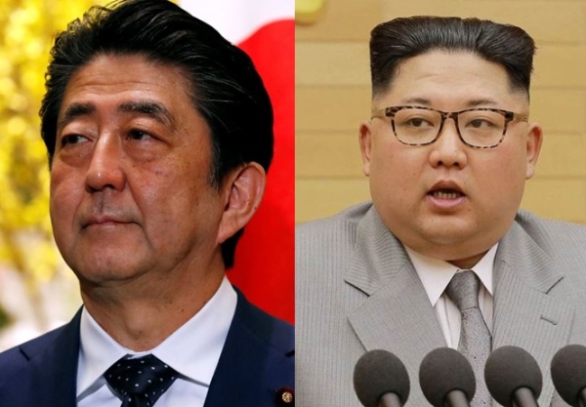 Japanese Prime Minister Shinzo Abe, left, and North Korean leader Kim Jong-un. (Reuters)