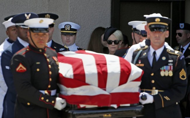 Cindy McCain, back right, walks with her son Jack McCain, back left, as the follow the military honor guard carrying the casket of Sen. John McCain, R-Ariz., after a memorial service at North Phoenix Baptist Church Thursday, Aug. 30, in Phoenix. (AP)