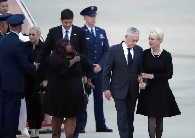 Cindy McCain walks with Defense Secretary Jim Mattis, followed by children Meghan, Bridget, and Andrew Thursday, Aug. 30, as the plane carrying the body of Sen. John McCain, R-Ariz., arrives at Andrews Air Force Base, Md. (AP)