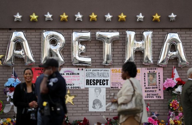 People gather outside New Bethel Baptist Church before a viewing for Aretha Franklin, Thursday, Aug. 30, 2018, in Detroit. Franklin died Aug. 16 of pancreatic cancer at the age of 76. (AP)