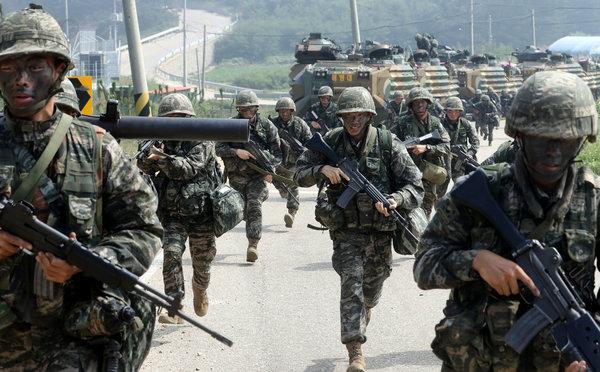 In a file photo, South Korean marines during a military exercise on Baengnyeong Island, near the disputed sea border with North Korea. (Reuters)