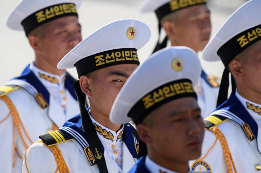 Korean People's Army (KPA) soldiers stand in formation prior to a military parade and mass rally on Kim Il Sung square in Pyongyang on September 9, 2018. (AFP)