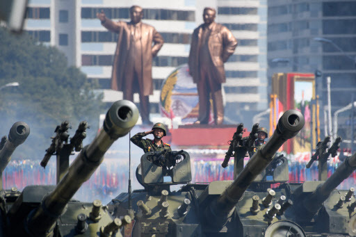 Korean People's Army (KPA) soldiers stand in formation prior to a military parade and mass rally on Kim Il Sung square in Pyongyang on September 9, 2018. (AFP)