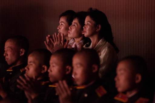 Audience members watch as performers take part in a concert at the Pyongyang Indoor Stadium on September 8, 2018.  (AFP)