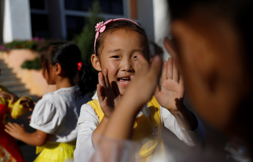 Toddlers sing at a kindergarten for farmer's children employed at a cooperative farm during a government organised visit for foreign reporters ahead of 70th anniversary of North Korea's foundation in Pyongyang, September 8, 2018. (REUTERS)