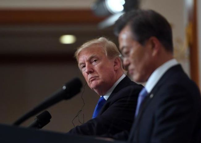 In a file photo taken on Nov. 7, 2017, US President Donald Trump and South Korea's President Moon Jae-in hold a joint press conference at the presidential Blue House in Seoul, South Korea. (Reuters)
