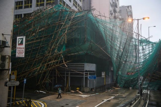 Hong Kong weather authorities issued their maximum alert for the storm, which hit the city with gusts of more than 230 kilometres per hour (142 mph) and left 213 people injured, according to government figures. (AFP)