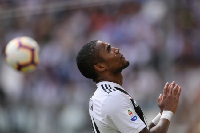 "Over the top reaction" - Brazilian Douglas Costa apologises for spitting at Federico Di Francesco. (AFP)