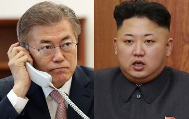 South Korean President Moon Jae-in (L) and North Korean leader Kim Jong-un (KCNA-Yonhap)