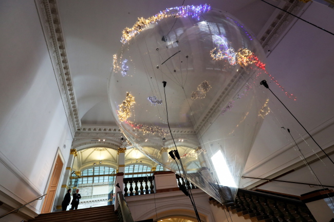 A light installation by artist Lee Bul is displayed in the stairway of the Martin Gropius Bau as part of the exhibition 'Lee Bul: Crash' at the Martin Gropius Bau in Berlin on Friday. (EPA-Yonhap)