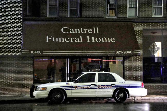A Detroit Police vehicle is parked outside the Cantrell Funeral Home in Detroit on Friday, Oct. 12. (AP)