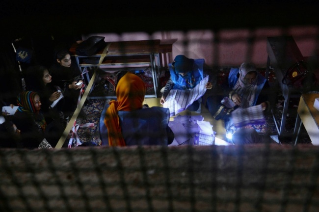 As officials counted ballots from the first day, there were concerns that extending voting by a second day "provides opportunity for fraud and misuse" (AFP)