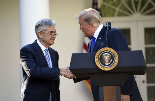 US President Donald Trump shakes hands as he announces his nominee for Chairman of the Federal Reserve, Jerome Powell, in the Rose Garden of the White House in Washington, DC, November 2, 2017 (AFP)