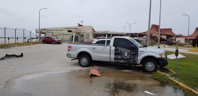 A Ford F-150 pickup truck with an Oakland Raiders logo sits at the damaged Saipan International Airport after Super Typhoon Yutu hit the Northern Mariana Islands, U.S., October 25, 2018 in this image taken from social media. (Reuters)