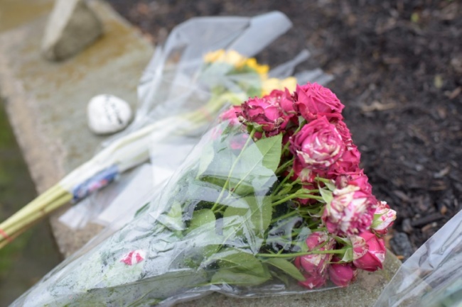 Flowers on a sidewalk after a shooting at the Tree of Life Synagogue in Pittsburgh, Pennsylvania (Getty Images via AFP)