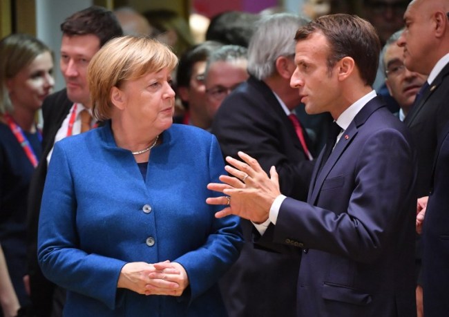 French President Emmanuel Macron (right) and German Chancellor Angela Merkel (AFP)