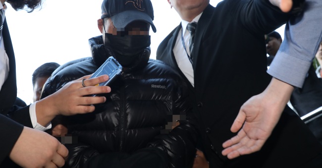 The man who allegedly killed his ex-wife appears for questioning at the Seoul Southern District Court on Thursday. (Yonhap)