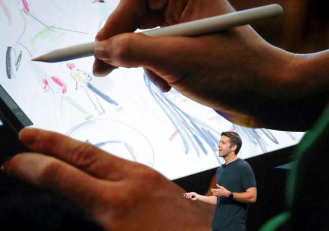 John Ternus, Apple's V.P. of Hardware Engineering, discuss the latest development for the iPad Pro during an event to announce new products Tuesday Oct. 30, in the Brooklyn borough of New York. (AP)