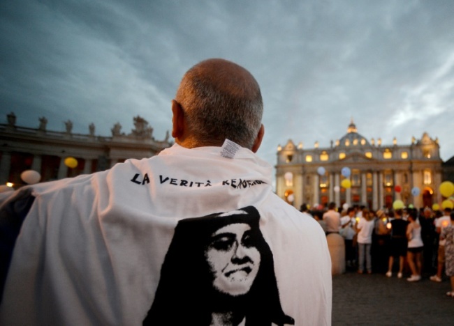 Emanuela Orlandi, whose face is seen on the t-shirt of a demonstrator in St. Peter's Square, was 15 when she vanished without a trace in Rome on June 22, 1983. (AFP)