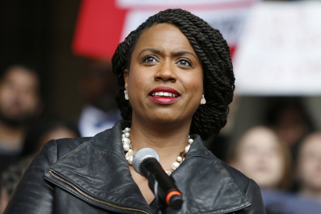 In this Oct. 1, 2018 file photo, Boston City Councilor Ayanna Pressley speaks at a rally at City Hall in Boston. On Nov. 6, Pressley became Massachusetts' first black woman elected to the U.S. House of Representatives. (AP)