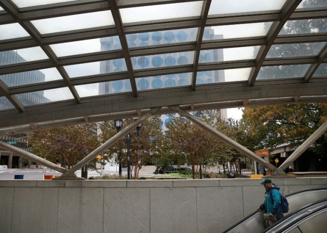 A man enters the Crystal City transit station in Arlington, Virginia, where Amazon will base one of its two new headquarters under a plan to invest $5 billion (AFP)