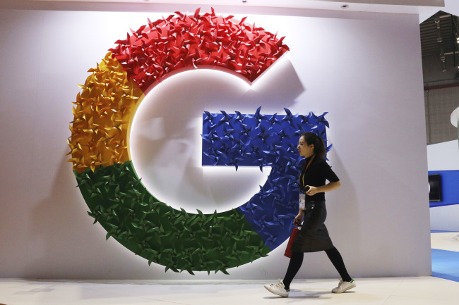 <YONHAP PHOTO-1630> In this Monday, Nov. 5, 2018, photo, a woman carries a fire extinguisher past the logo for Google at the China International Import Expo in Shanghai. Internet traffic hijacking disrupted several Google services Monday, Nov. 12, 2018, including search and cloud-hosting services. (AP Photo/Ng Han Guan)/2018-11-13 10:40:15/ <저작권자 ⓒ 1980-2018 ㈜연합뉴스. 무단 전재 재배포 금지.>
<YONHAP PHOTO-1630> In this Monday, Nov. 5, 2018, photo, a woman carries a fire extinguisher past the logo for Google at the China International Import Expo in Shanghai. Internet traffic hijacking disrupted several Google services Monday, Nov. 12, 2018, including search and cloud-hosting services. (AP Photo/Ng Han Guan)/2018-11-13 10:40:15/ <저작권자 ⓒ 1980-2018 ㈜연합뉴스. 무단 전재 재배포 금지.>