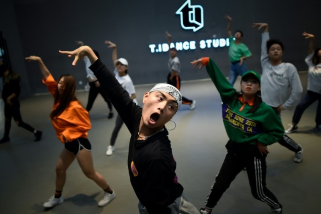 Although China's street dance scene took root in the 2000s it wasn't until recently that it exploded into mainstream culture (AFP)