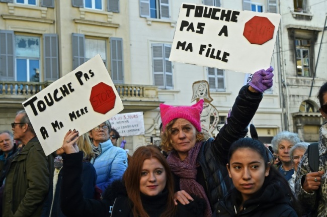 Around 50,000 people turned out for rallies in several French cities demanding action against gender violence (AFP)