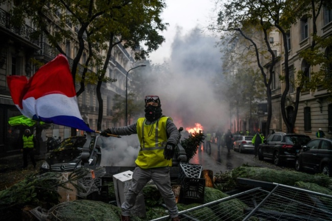 The 'yellow vest' protests started over high fuel taxes (AFP)