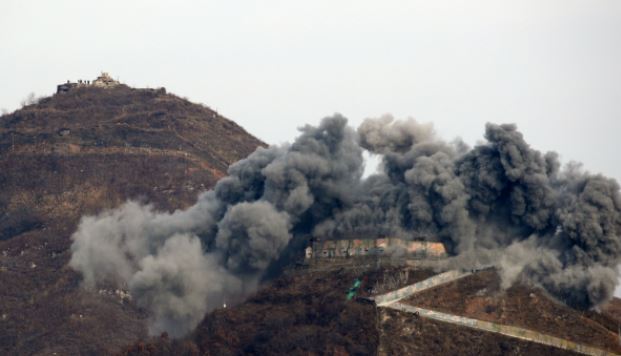 A guard post gets destroyed on the South Korean side of the fortified area in Gangwon Province, Nov. 15.(Yonhap)