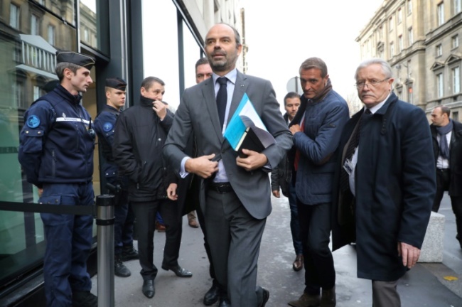 French Prime Minister Edouard Philippe announced the first major U-turn of Macron's presidency when he suspended a rise in fuel taxes scheduled for January 1 (AFP)
