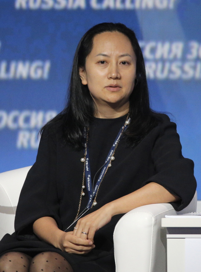 <YONHAP PHOTO-2232> epa07211367 (FILE) - Meng Wanzhou, Chief Financial Officer of Huawei, attends the VTB Capital's 'RUSSIA CALLING' investment forum in Moscow, Russia, 02 October 2014 (reissued 06 December 2018). Meng Wanzhou has been arrested in Canada at the request of US authorities. According to US media reports, Meng Wanzhou was detained for potential US sanction violations. EPA/MAXIM SHIPENKOV/2018-12-06 09:30:43/ <저작권자 ⓒ 1980-2018 ㈜연합뉴스. 무단 전재 재배포 금지.>
<YONHAP PHOTO-2232> epa07211367 (FILE) - Meng Wanzhou, Chief Financial Officer of Huawei, attends the VTB Capital's 'RUSSIA CALLING' investment forum in Moscow, Russia, 02 October 2014 (reissued 06 December 2018). Meng Wanzhou has been arrested in Canada at the request of US authorities. According to US media reports, Meng Wanzhou was detained for potential US sanction violations. EPA/MAXIM SHIPENKOV/2018-12-06 09:30:43/ <저작권자 ⓒ 1980-2018 ㈜연합뉴스. 무단 전재 재배포 금지.>