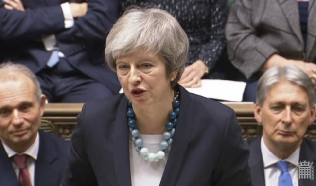 In this grab taken from video, Britain's Prime Minister Theresa May makes a statement in the House of Commons, in London, Monday, Dec. 10, 2018. May has postponed Parliament's vote on her European Union divorce deal to avoid a shattering defeat _ a decision that throws her Brexit plans into chaos. (PA-AP)