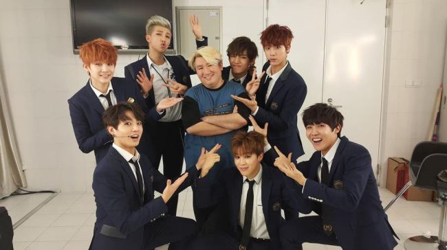 This photo of BTS and Bang Si-hyuk was posted on Bang's Twitter account on Dec. 29, 2014.