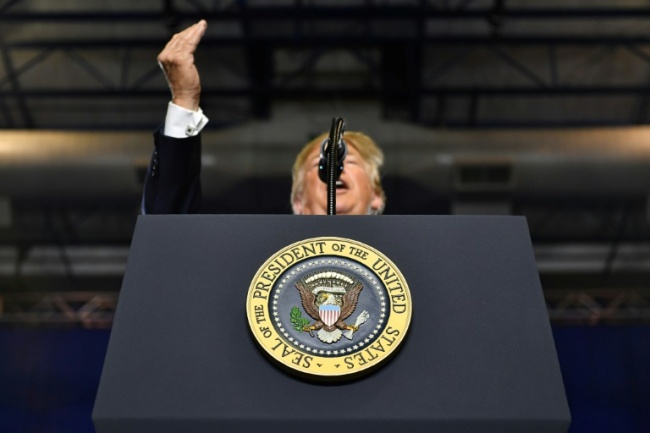 US President Donald Trump has popularised the term 'fake news' and used it to attack the news media (AFP)
