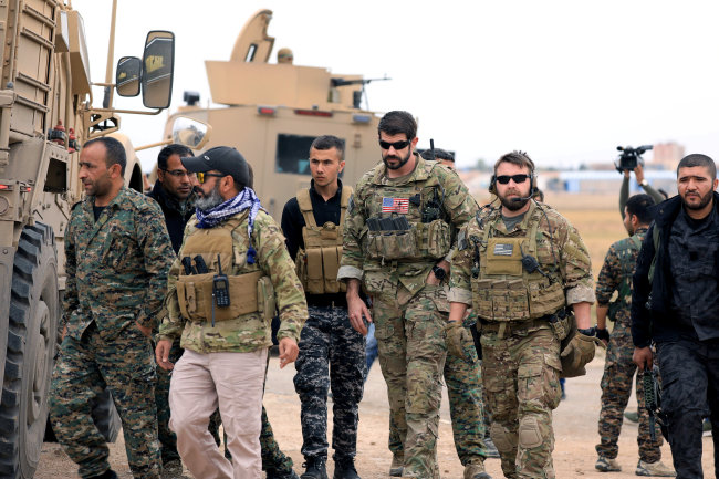 <YONHAP PHOTO-5441> FILE PHOTO: Syrian Democratic Forces and U.S. troops are seen during a patrol near Turkish border in Hasakah, Syria November 4, 2018. REUTERS/Rodi Said/File Photo/2018-12-19 23:15:35/ <저작권자 ⓒ 1980-2018 ㈜연합뉴스. 무단 전재 재배포 금지.>
<YONHAP PHOTO-5441> FILE PHOTO: Syrian Democratic Forces and U.S. troops are seen during a patrol near Turkish border in Hasakah, Syria November 4, 2018. REUTERS/Rodi Said/File Photo/2018-12-19 23:15:35/ <저작권자 ⓒ 1980-2018 ㈜연합뉴스. 무단 전재 재배포 금지.>