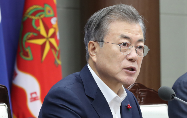 President Moon Jae-in attends the Ministry of National Defense's briefing in Seoul on Thursday. Yonhap
