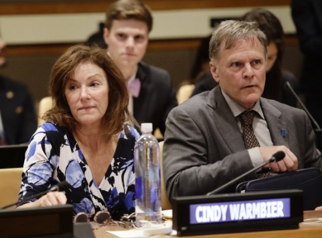 In this May 3, 2018, file photo, Fred Warmbier, right, and Cindy Warmbier, parents of Otto Warmbier, wait for a meeting at the United Nations headquarters. A federal judge has ordered North Korea to pay more than $500 million in a wrongful death suit filed by the parents of Otto Warmbier, an American college student who died shortly after being released from that country. (AP)