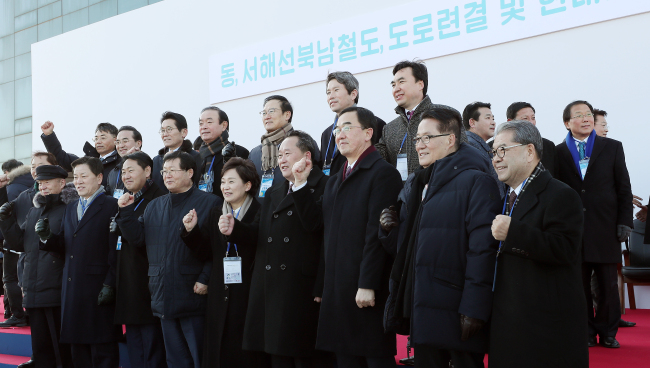 South and North Korean officials participate in the groundbreaking ceremony for inter-Korean railways and roads in Kaesong, North Korea on Wednesday. (Joint Press Corps)