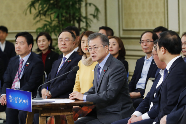 President Moon Jae-in speaks at the meeting with businesspeople running SMEs and startups at the presidential office in Seoul on Monday. Yonhap