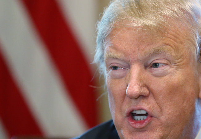 <YONHAP PHOTO-0573> U.S. President Donald Trump addresses state, local, and community leaders as he hosts a "roundtable discussion on border security and safe communities" in the Cabinet Room of the White House in Washington, U.S., January 11, 2019. REUTERS/Leah Millis/2019-01-12 06:31:07/ <저작권자 ⓒ 1980-2019 ㈜연합뉴스. 무단 전재 재배포 금지.>
<YONHAP PHOTO-0573> U.S. President Donald Trump addresses state, local, and community leaders as he hosts a "roundtable discussion on border security and safe communities" in the Cabinet Room of the White House in Washington, U.S., January 11, 2019. REUTERS/Leah Millis/2019-01-12 06:31:07/ <저작권자 ⓒ 1980-2019 ㈜연합뉴스. 무단 전재 재배포 금지.>