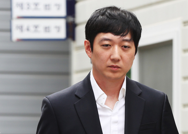 Former short track coach Cho Jae-beom seen before his court appearance in June last year. Yonhap